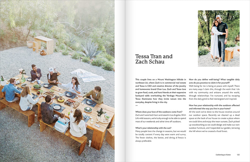 A spread from a magazine showcasing an Al Fresco: Inspired Ideas for Outdoor Living spread by Books, featuring a dining experience with family and friends sitting around a table engaged in outdoor activities.