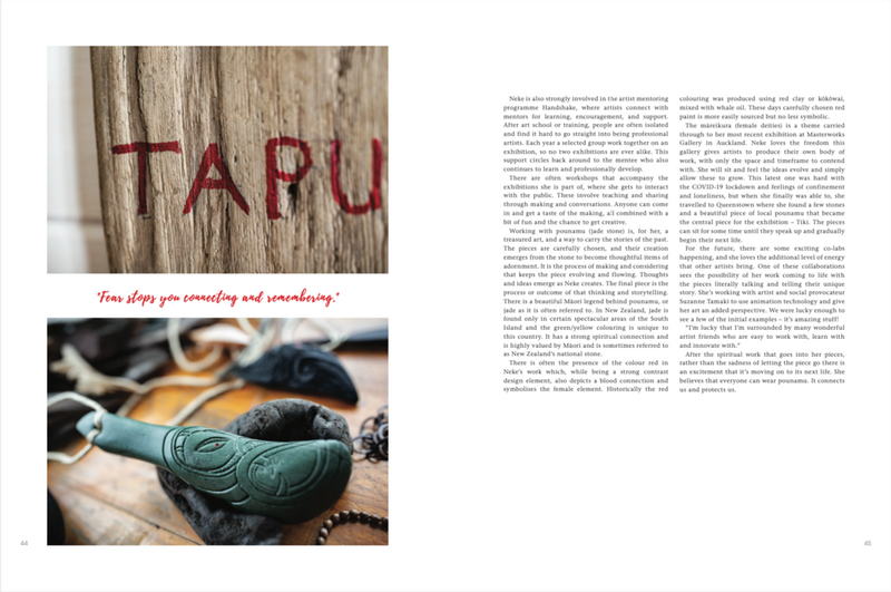 A magazine featuring a vibrant tarot card picture from Spirit | Conversations With Creative Women and an artistic piece of wood, catering to New Zealand women creatives by Books.