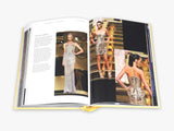 An open Catwalk: The Complete Fashion Collections - Various Options book with images of women in dresses.