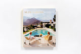 A Slim Aarons: Women book with two people sitting in front of a pool.