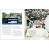 A tropical-themed bedroom featured in a magazine for renovators and showcased on YouTube and Instagram, featuring the Three Birds Renovations - 400+ Renovation and Styling Secrets Revealed book.
