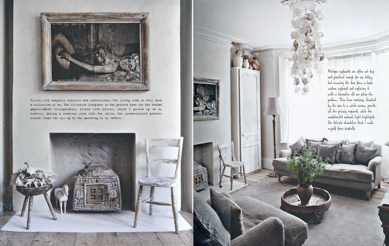 A magazine spread showcasing "A Life Less Ordinary | Interiors and Inspirations" by Books, a cozy living room with stylish furniture and a warm fireplace, perfect for interior design enthusiasts and lifestyle book lovers.