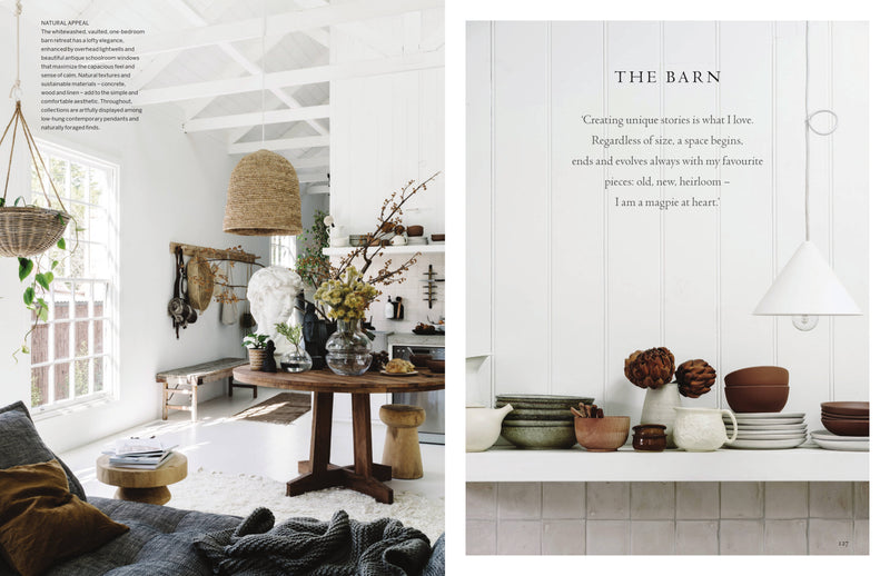A magazine spread showcasing a living room adorned with Curate by Lynda Gardener & Ali Heath books, featuring a neutral palette and white furniture.