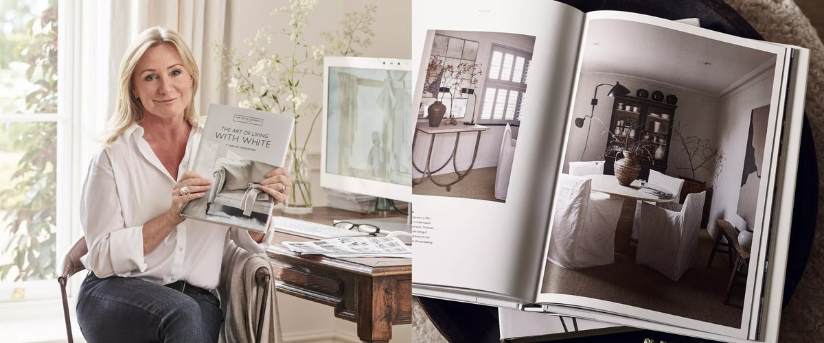 The Art of Living With White page spread showing a summer interior