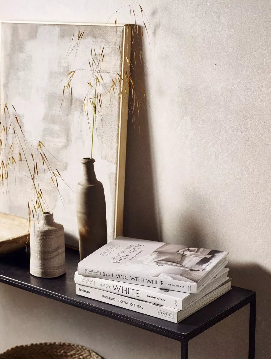 The Art of Living With White page spread showing a spring interior