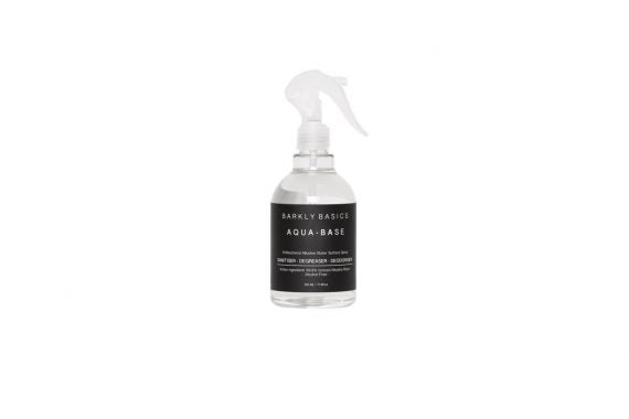 A bottle of Barkly Basics Sanitising Surface Spray on a white background.