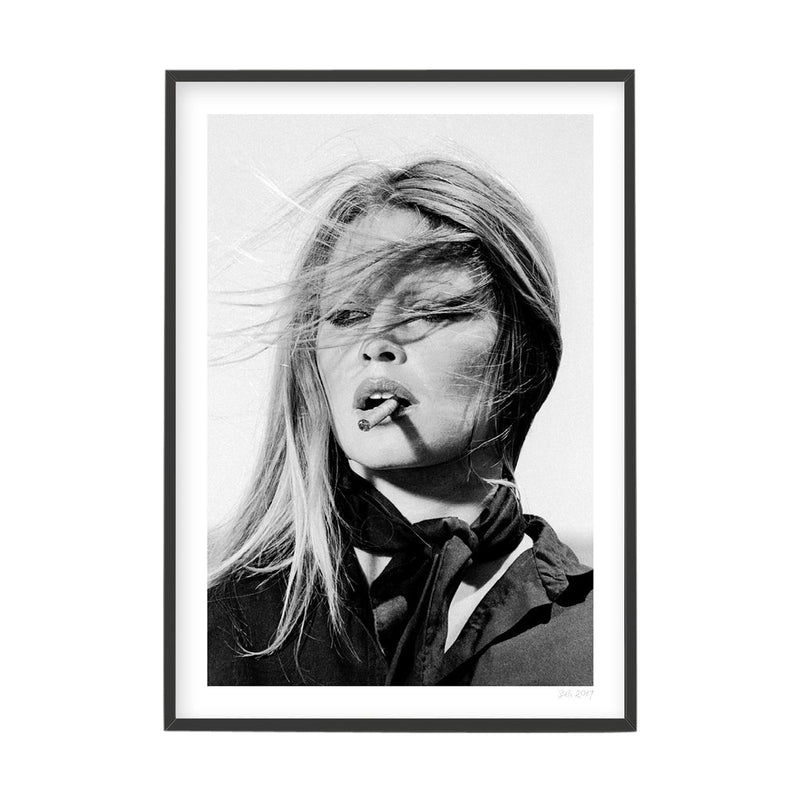 A black and white photo of a woman smoking a cigarette from BARDOT, available for delivery.