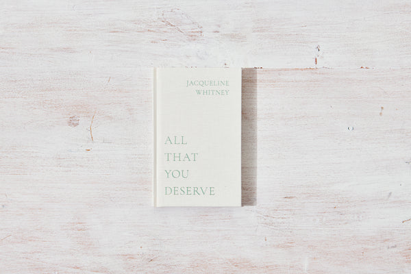 A healing book with the words All That You Deserve by Jacqueline Whitney on it. (Thought Catalog)