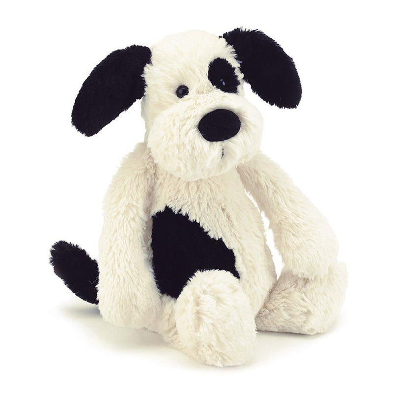 A silky-soft and adorable Jellycat Bashful Black & Cream Puppy Medium sitting on a white background.