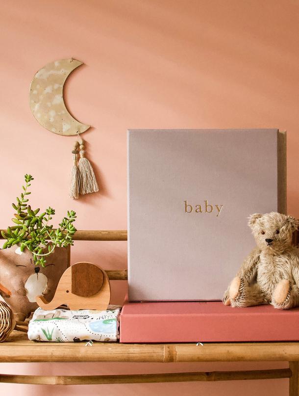 A nursery gift box from Write To Me with a teddy bear and a diary.