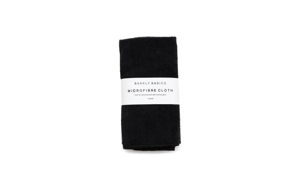 A black Microfibre Cloth - Pack of 2 with a reusable label on it, made by Barkly Basics.