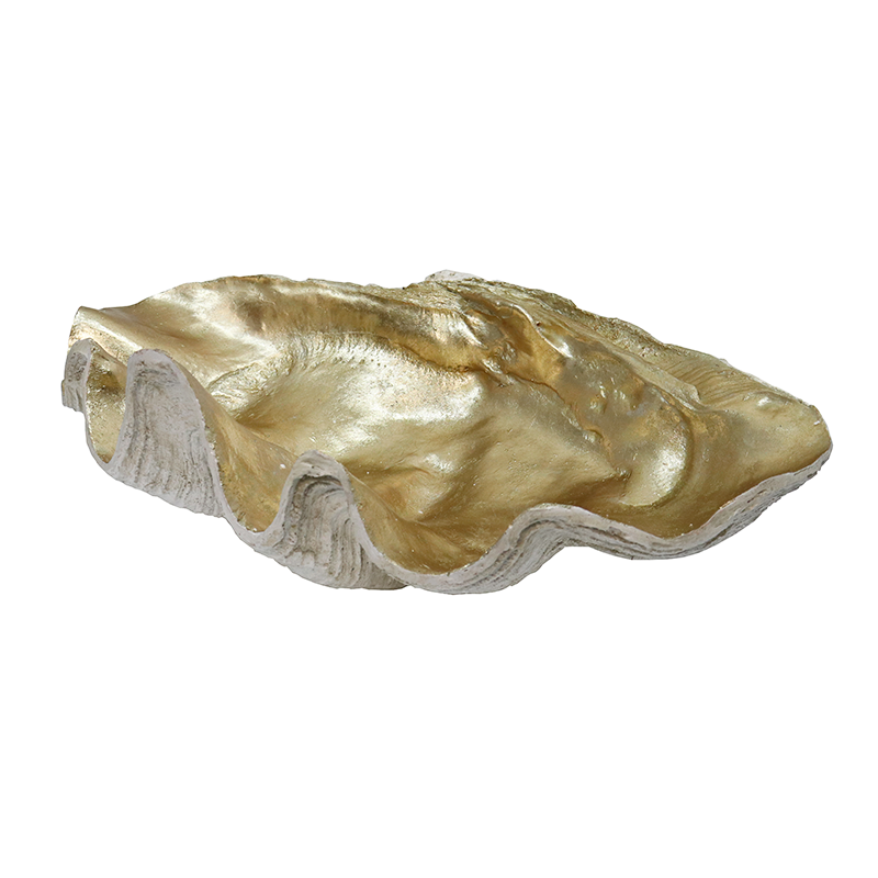 Side view of the champagne clam shell bowl showing its rippled rim on white