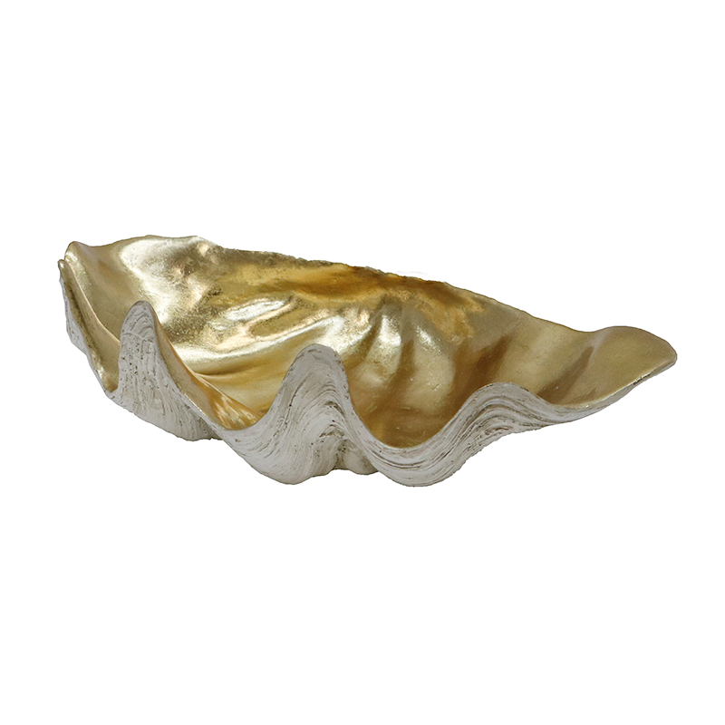 Clam shell bowl at a low angle showing its curved lip and champagne lining