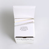 An Ecoya Celebration scented candle box with a quote, perfect for gifts and lovers of fragrance.