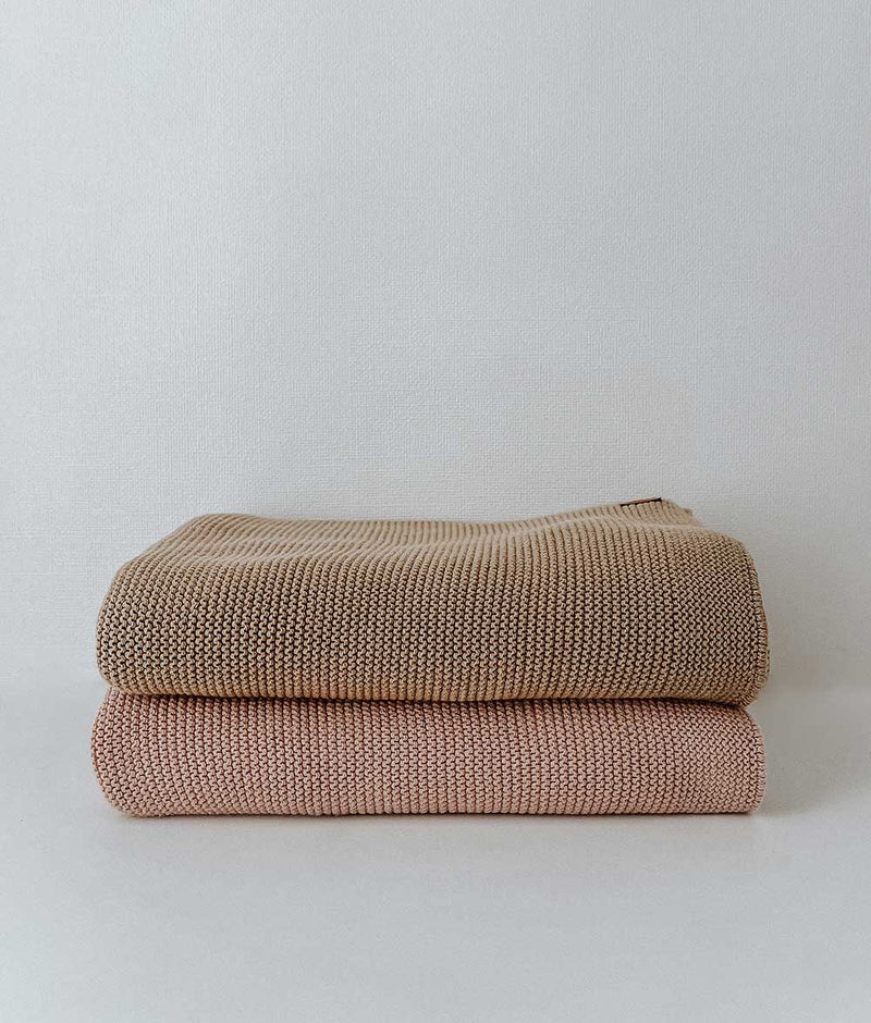 Two CLASSIC KNIT BLANKET - KHAKI blankets from Bengali Collections stacked on top of each other.