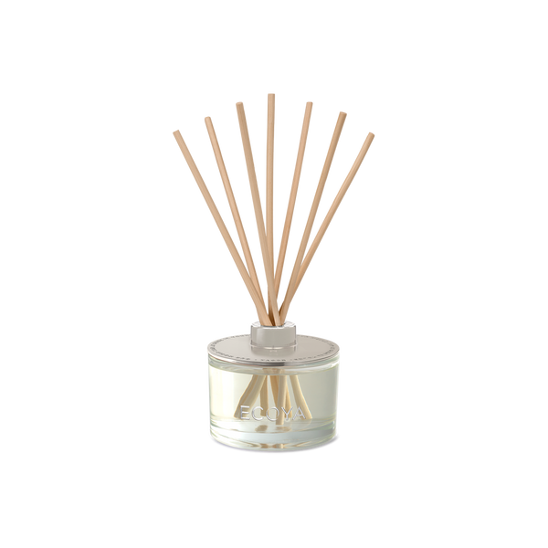 An Ecoya Fragranced Diffuser with sticks in it, perfect for scandinavian-inspired gifts and fragrant spaces.