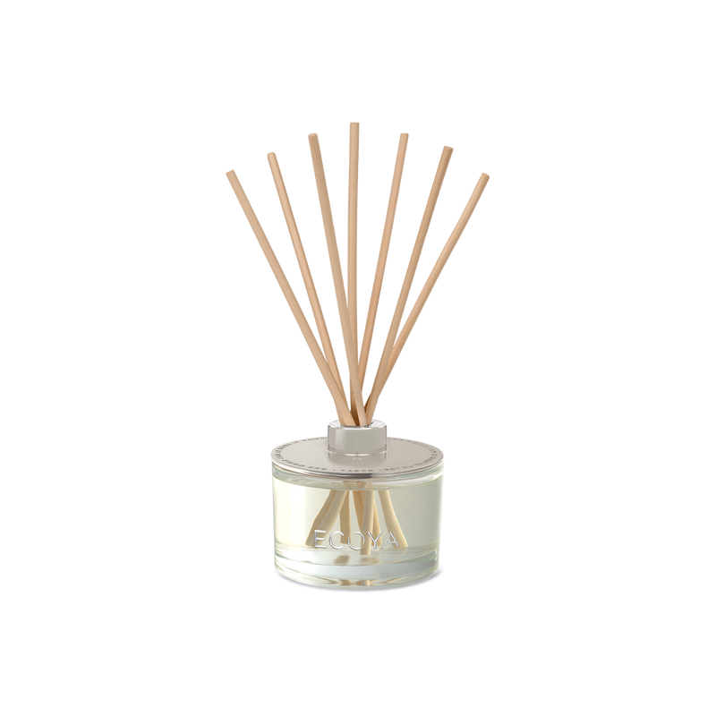 An Ecoya Fragranced Diffuser with sticks in it, perfect for scandinavian-inspired gifts and fragrant spaces.