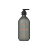 A fragrance-filled bottle of Ecoya Hand and Body Wash on a sleek black background, inspired by Scandinavian design.