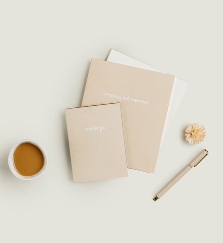 Musings Petite Notebook styled on a desk by Emma Kate Co