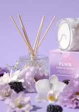 The Aromatherapy Co FLWR Diffuser - Purple Reign with flowers and blackberries.