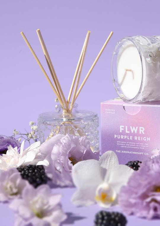 The Aromatherapy Co FLWR Diffuser - Purple Reign with flowers and blackberries.