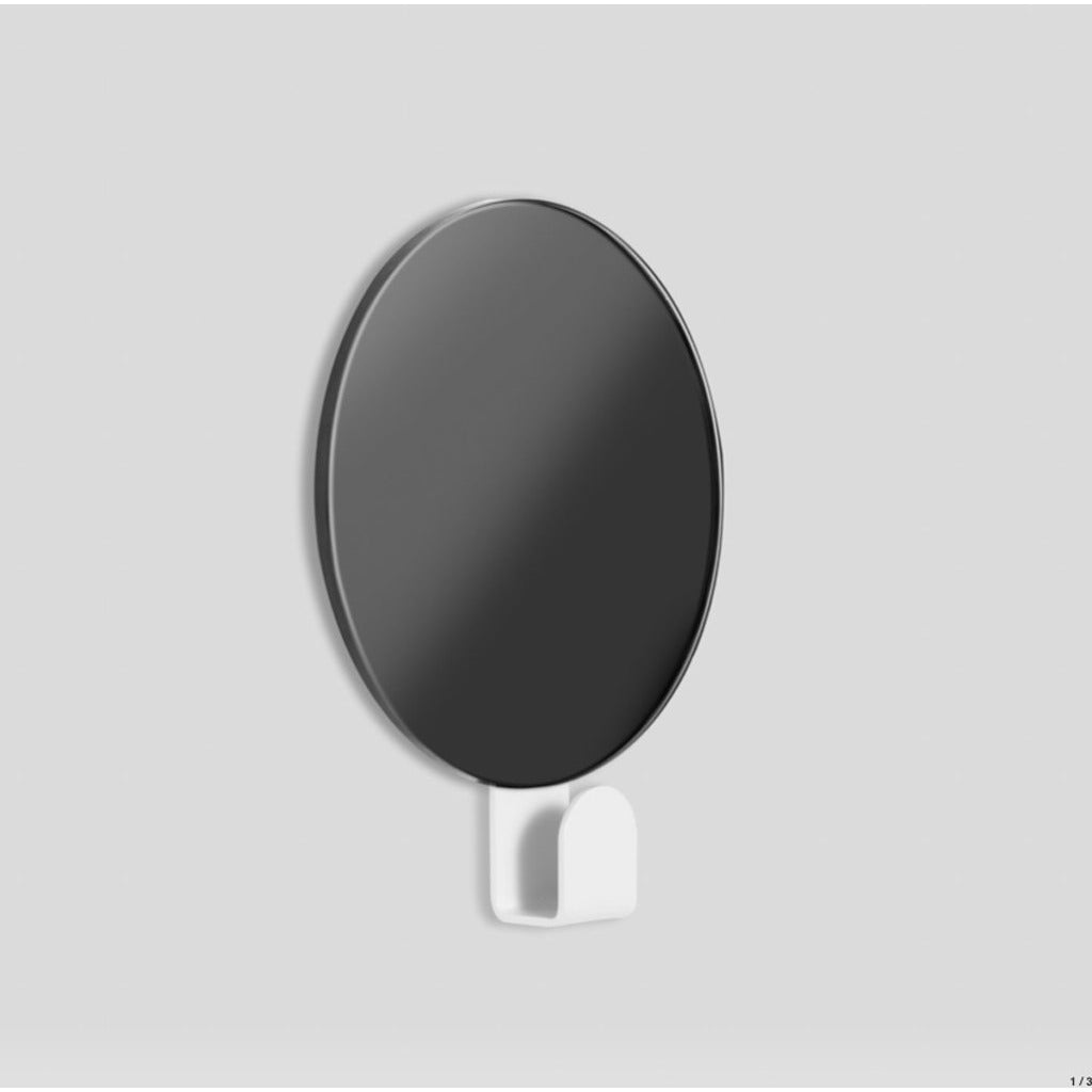 FOLD Hook Mirror White mounted on a wall by Made of Tomorrow