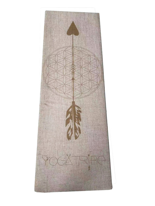 A Yogatribe | Organic Jute 100% Eco Yoga Mat with an image of an arrow and a feather.