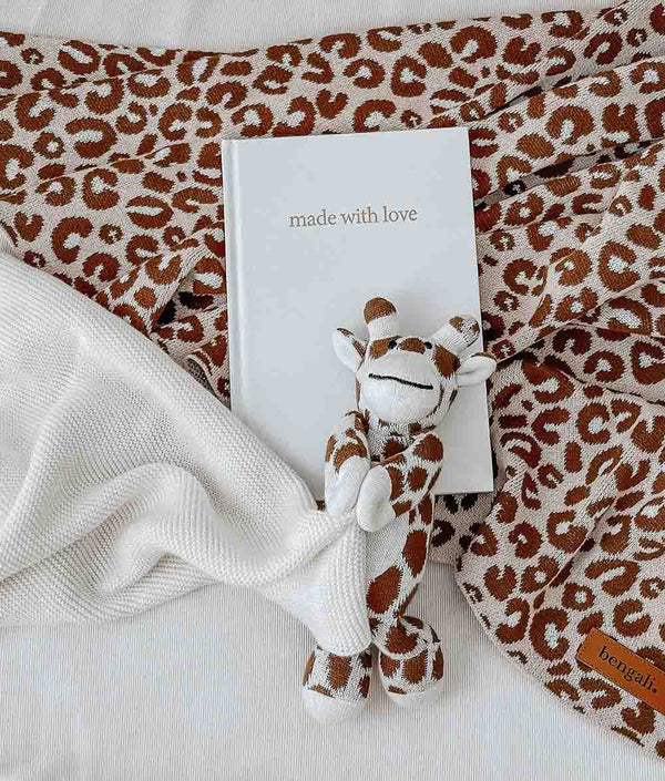 An eco-friendly GIRAFFE SNUGGLY made with Oeko-tex® certified cotton from Bengali Collections.