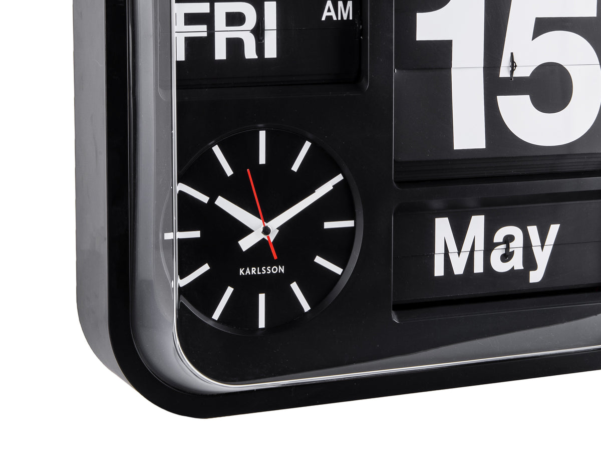 Karlsson Big Flip calendar clock in black, detail of the flip calendar beneath the clock face