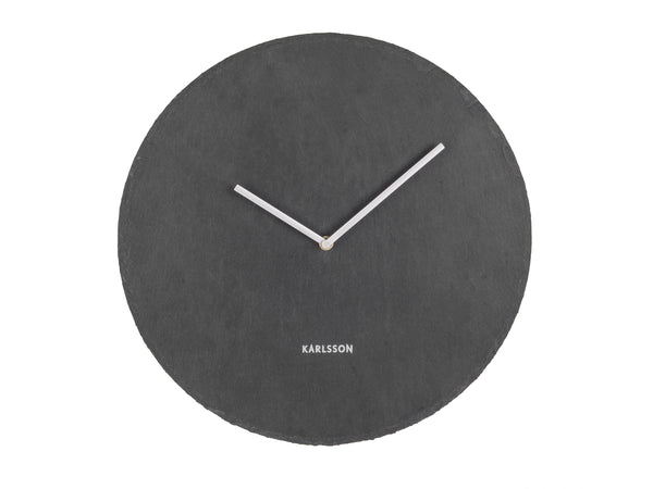 A Karlsson SLATE CLOCK BLACK - Medium with a white face in a minimal aesthetic design.