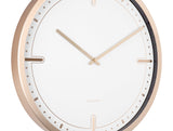 A stylish Dots & Batons wall clock by Karlsson with a rose gold frame.
