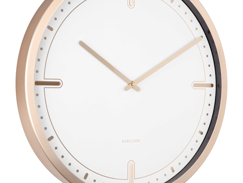 A stylish Dots & Batons wall clock by Karlsson with a rose gold frame.
