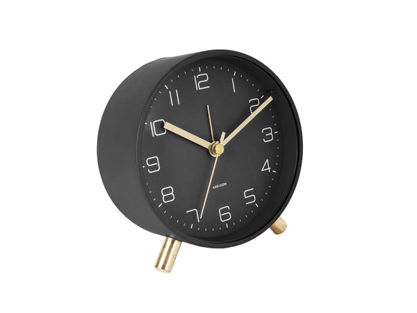 A Scandinavian-designed clock with a sleek black and gold finish, featuring a built-in light.