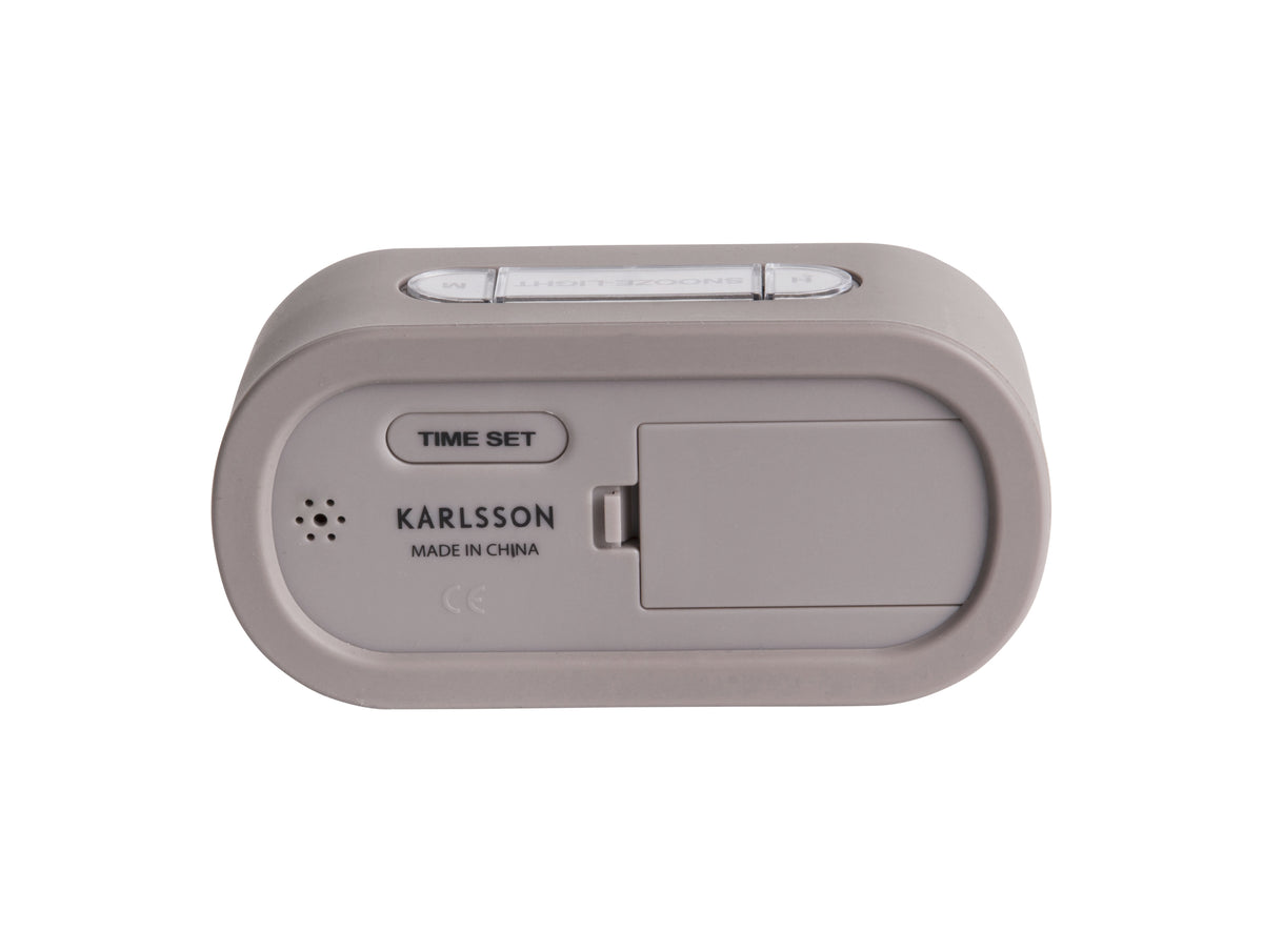 Back of the grey Karlsson Gummy alarm clock showing the battery compartment