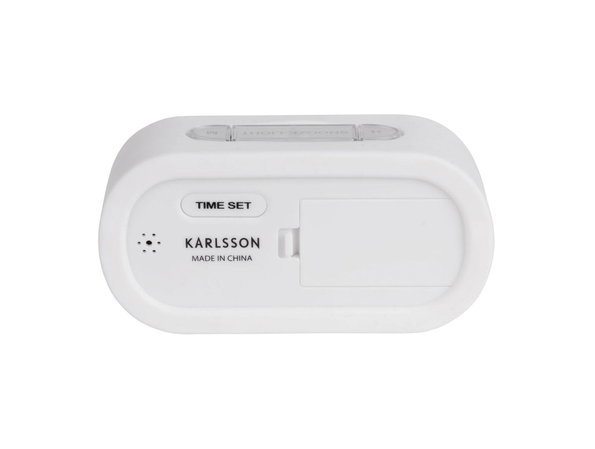 Back of the white Karlsson Gummy alarm clock showing the battery compartment