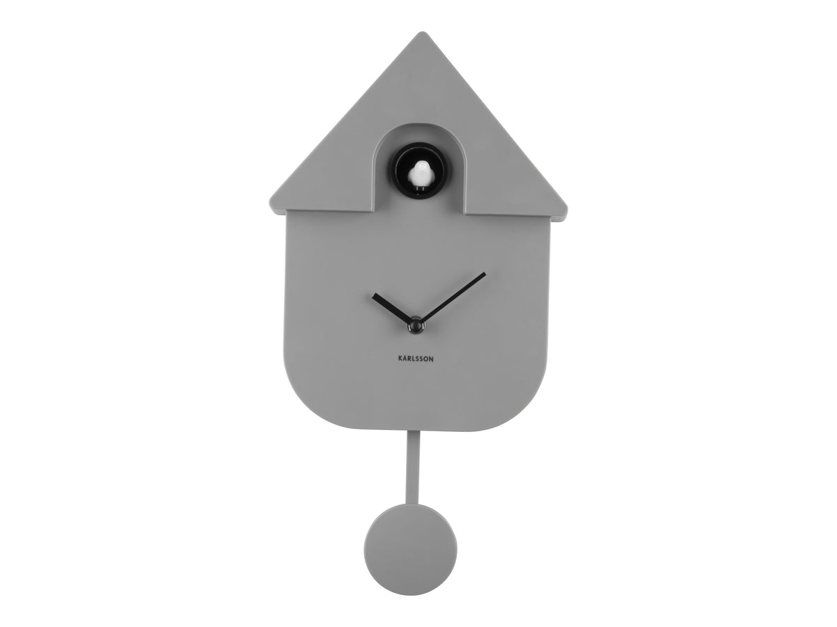 Karlsson Modern Cuckoo Clock in grey hanging on a white wall