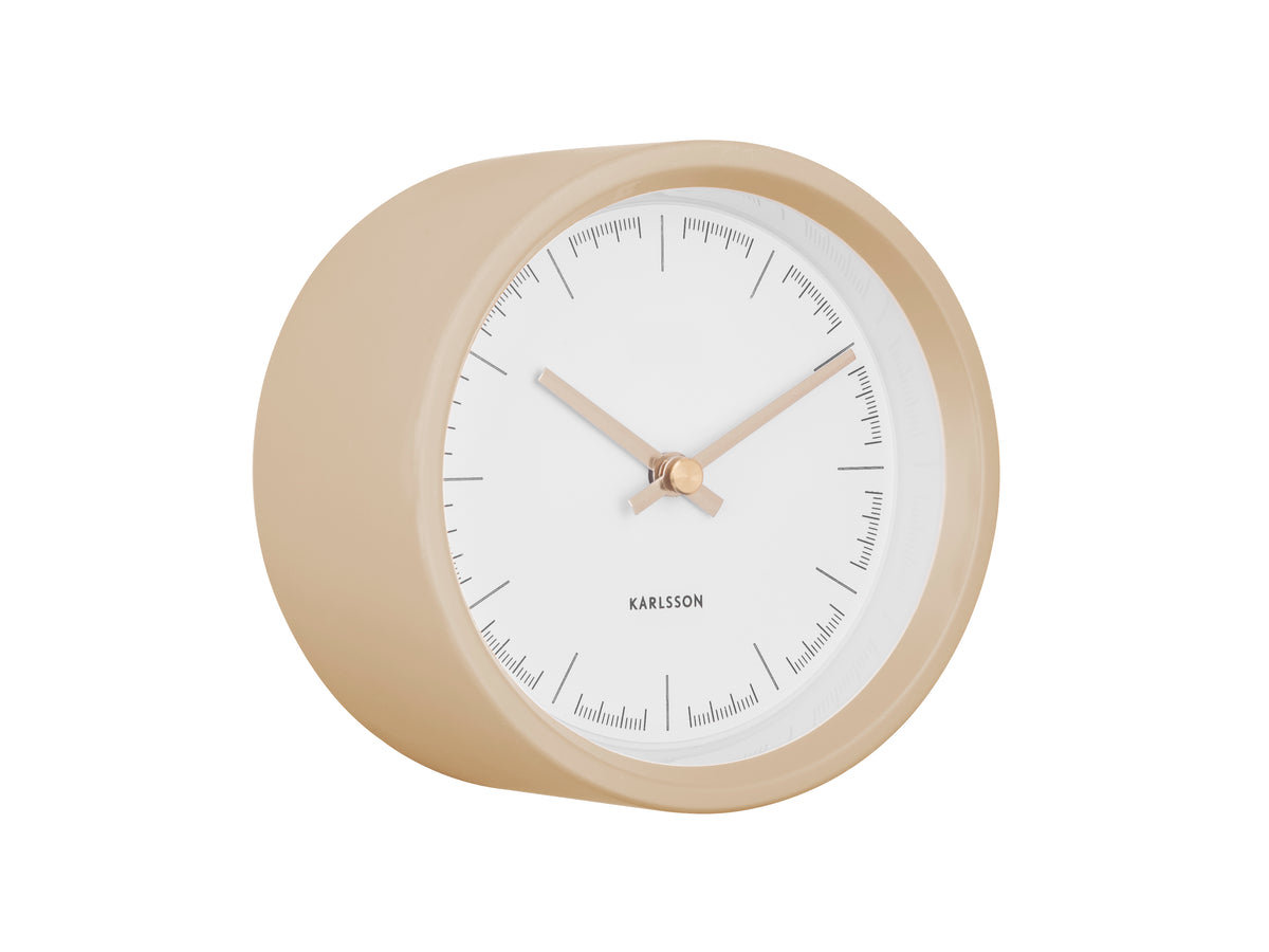 Dense Alarm Clock by Karlsson in sand, angled view