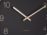 An elegant Karlsson Charm Wall Clock - Various Colours featuring gold hands and engraved gold numbers.