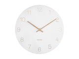A Karlsson Charm Wall Clock - Various Colours with engraved gold numbers on a white background.