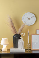 A Karlsson Charm Wall Clock with Engraved Gold Numbers.