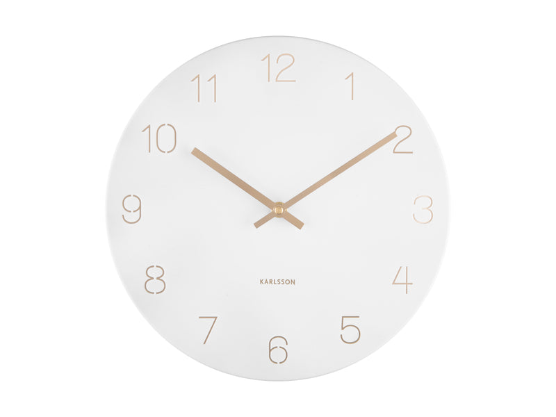 A Karlsson Charm Wall Clock - Various Colours with engraved gold numbers on a white background.