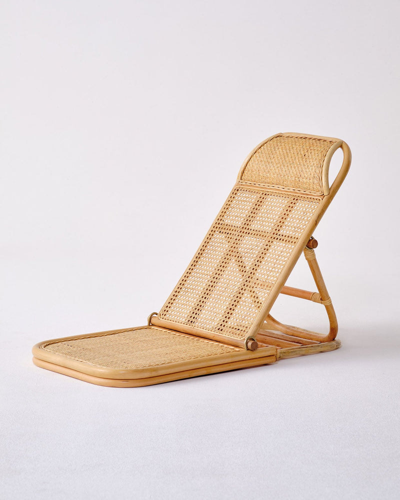 A lightweight Brel Club Rattan Lounger - Large on a white background.