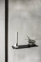 A FOLD Ledge 450mm ∙ Black shelf with a candle on it, made by Made of Tomorrow.