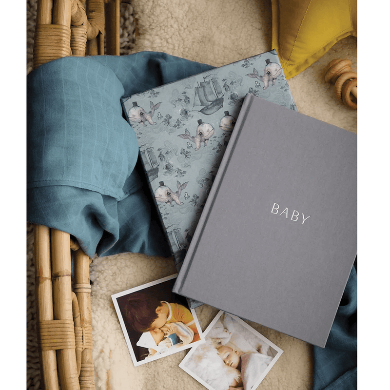 A limited edition Mrs Mighetto X Write To Me Baby Journal, featuring Mrs. Mighetto artwork, capturing the precious moments from birth to five years of a baby's life.