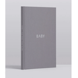 A limited edition Mrs Mighetto X Write To Me baby journal with the word baby on its cover.