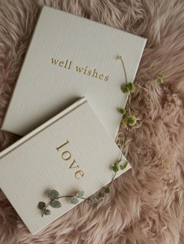 A gender neutral guided journal containing well wishes and love for couples planning a wedding called "Love - Our Wedding Planner" by Write To Me.