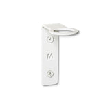 A Made of Tomorrow FOLD Bottle Holder ∙ White with the letter m on it.