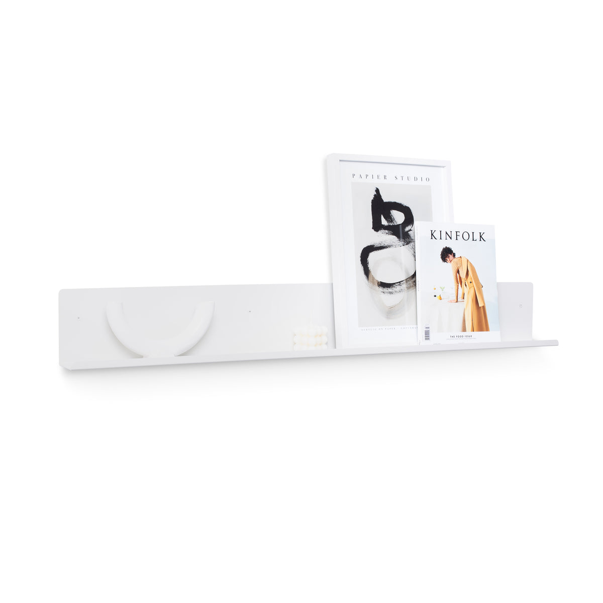 Made of Tomorrow FOLD Display Ledge 1200mm in white with a magazine and a book