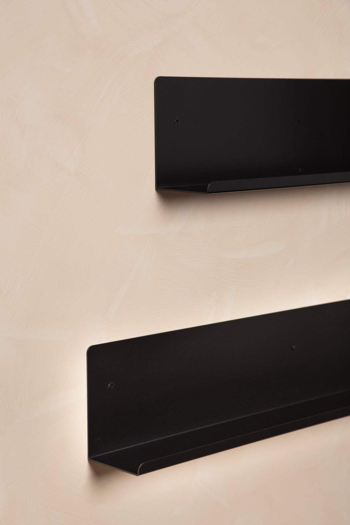 Close up of FOLD Display Ledge 600mm Black powder-coated finish