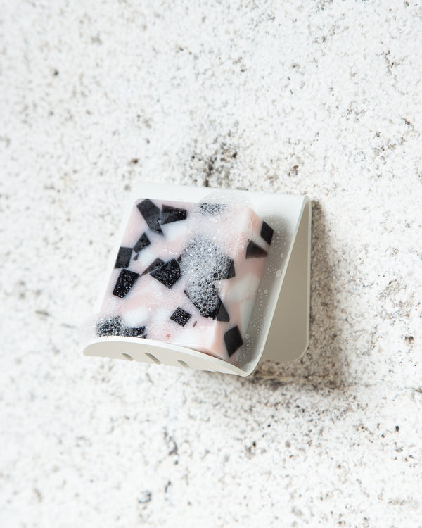 A FOLD Soap Block Holder ∙ White made by Made of Tomorrow with black and white squares on it.